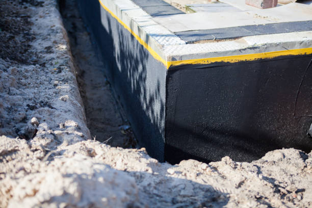 Professional Exterior Waterproofing technician working in De Graff, OH
